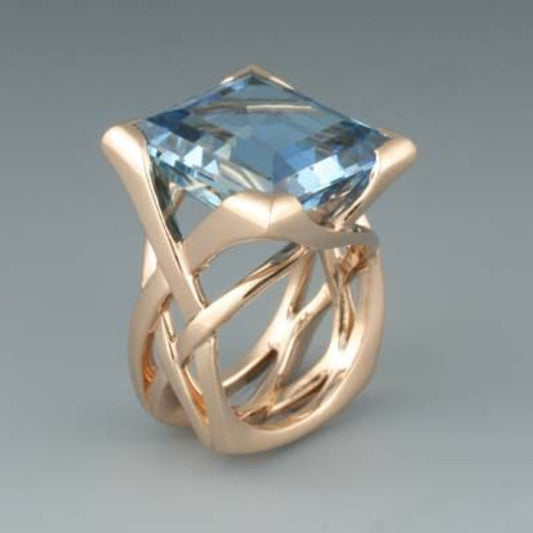 Rose Gold Blue Zirconia Ring – Timeless Elegance